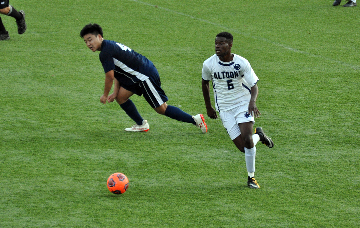 Photo: Junior forward Emerson Mendes looks upfield during the Lions' loss to Pitt-Bradford on Saturday at Spring Run Stadium.